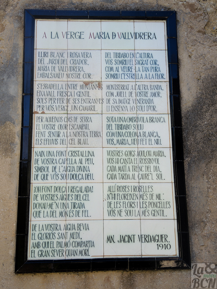 Poema de Mossèn Cinto Verdaguer a la Verge Maria de Vallvidrera en la entrada del cementerio